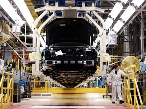 A new survey finds that a shortage of skilled workers and funding is hurting manufacturers' ability to take up new technology.&ampnbsp;General view of production along the Honda CRV production line is shown during a tour of a Honda manufacturing plant in Alliston, Ont., Wednesday, Apr. 5, 2023.