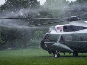 Marine One, with President Joe Biden on board, lifts off during a downpour of rain on the South Lawn of the White House in Washington, Monday, May 29, 2023.