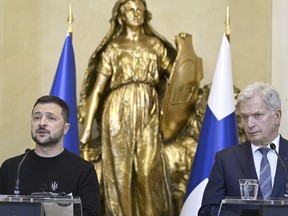 Ukrainian President Volodymyr Zelensky, left, and Finnish President Sauli Niinist, right, address the media during a press conference as part of the Nordic-Ukrainian summit at the Presidential Palace in Helsinki, Finland, Wednesday, May 3, 2023.