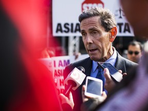 Edward Blum, president of Students for Fair Admissions, speaks to members of the media during a protest against Harvard University's admission process at Copley Square in Boston, on Oct. 14, 2018.