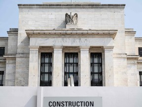 The U.S. Federal Reserve building is seen amid renovations on May 24.