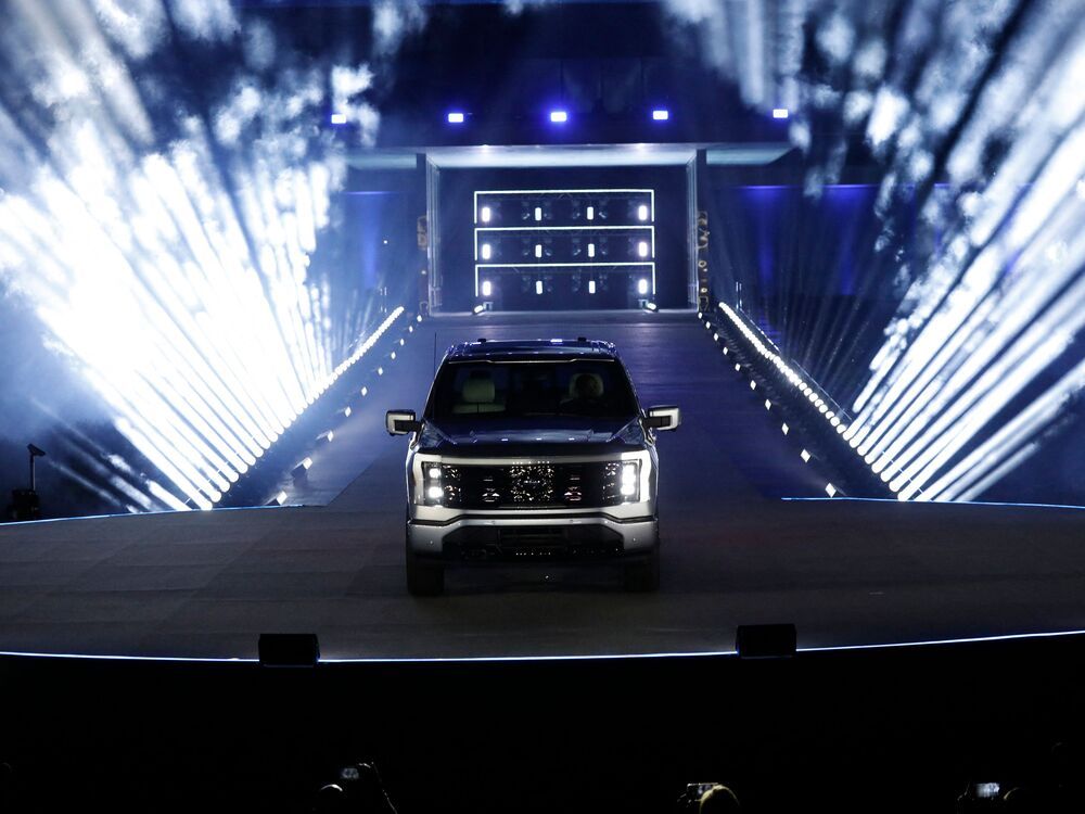 Ford's new electric F-150 Lightning outside of its headquarters.