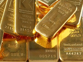 Gold bars from the vault of a bank in Zurich. Some of the world's wealthiest people have been rushing to store gold.