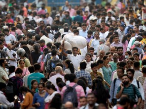 People in a marketplace in Mumbai, India, on April 24.
