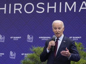 President Joe Biden gestures during a news conference in Hiroshima, Japan, Sunday, May 21, 2023, after the G7 Summit.