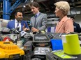 Li-Cycle CEO Ajay Kochhar speaks with Prime Minister Justin Trudeau and President of the European Union Ursula von der Leyen during a tour of Li-Cycle's Kingston location on Tuesday, March 7, 2023.