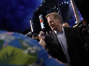 NFL Commissioner Roger Goodell meets with fans during the first round of the NFL football draft, Thursday, April 27, 2023, in Kansas City, Mo.