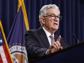 U.S. Federal Reserve board chairman Jerome Powell delivers remarks at a news conference in Washington, DC.