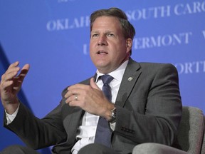 FILE - New Hampshire Gov. Chris Sununu takes part in a panel discussion during a Republican Governors Association conference on Nov. 15, 2022, in Orlando, Fla. A day after New Hampshire lawmakers rejected the latest attempt to legalize recreational marijuana in the state, Sununu, on Friday, May 12, 2023, has proposed a path to achieve it in a manner similar to the way the state controls liquor sales. The state is the only one in New England that makes smoking pot recreationally a crime.