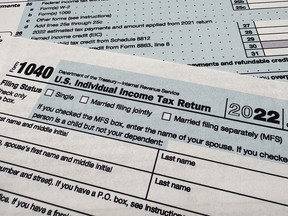 FILE - The Internal Revenue Service 1040 tax form for 2022 is seen on April 17, 2023. The IRS is planning to launch a pilot program for a government-run, online tax filing system that's free for all. After months of research, the IRS published a feasibility report on Tuesday, May 16, 2023, laying out taxpayer interest in direct file, how the system could work, its potential cost, operational challenges and more.