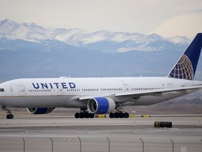 FILE - A United Airlines jetliner taxis to a runway for take off from Denver International Airport, Dec. 27, 2022. United Airlines reports earnings on Tuesday, April 18, 2023.