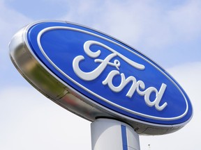 FILE - A Ford sign is shown at a dealership in Springfield, Pa., Tuesday, April 26, 2022. Ford Motor Co. is recalling certain 2004 to 2006 Ranger vehicles, Friday, May 5, 2023, because replacement front passenger air bag inflators may have been installed incorrectly. The National Highway Traffic Safety Administration said in a letter that the recall includes 231,942 vehicles.