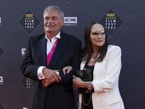 FILE - Leonard Whiting, left, and Olivia Hussey arrive at the screening of "The Producers" at the 2018 TCM Classic Film Festival Opening Night at the TCL Chinese Theatre on April 26, 2018, in Los Angeles. A Los Angeles County judge on Thursday, May 25, 2023, said she will dismiss a lawsuit that the stars, Whiting and Hussey, of 1968's "Romeo and Juliet" filed over the film's nude scene, which they said involved them being subjected to fraud, and sexual abuse and harassment when they were in their teens.
