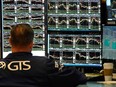 A trader works at the New York Stock Exchange.