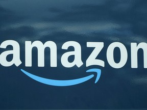 FILE - An Amazon logo appears on a delivery van, Oct. 1, 2020, in Boston. Officials in a remote northeastern Oregon county voted Wednesday, May 10, 2023, to give tax breaks worth an estimated $1 billion to Amazon for five more data centers there.