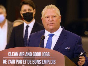 Ontario Premier Doug Ford speaks at a press conference in Windsor with Prime Minister Justin Trudeau in May, 2022 when the Stellantis announced a $3.6 billion investment to retool Windsor and Brampton facilities.