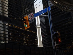 The CN Tower from Bay Street In the financial district in Toronto.