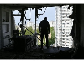Mayor of Kyiv, Vitali Klitschko, examines high-rise residential building damaged by remains of a shot down Russian drone in Kyiv on May 8. Photographer: Genya Savilov/AFP/Getty Images