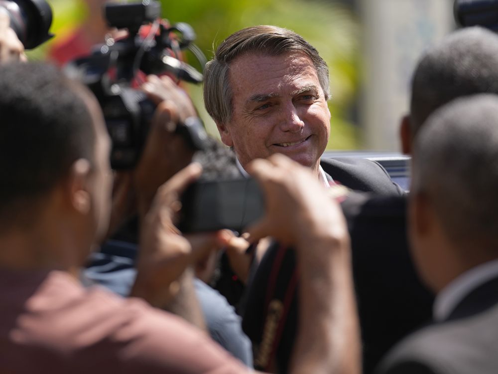 Brazil police search Bolsonaro’s home, seize his phone