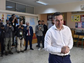 Leader of the main opposition Syriza party, Alexis Tsipras casts his vote at a polling station in Athens, Greece, Sunday, May 21, 2023. Polls have opened in Greece's parliamentary election, the first since the country's economy ceased to be subject to strict supervision and control by international lenders who had provided bailout funds during its nearly decade-long financial crisis.