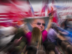 Supporters of President Recep Tayyip Erdogan celebrate outside his residence in Istanbul, Turkey, Sunday, May 28, 2023. Turkey's President Recep Tayyip Erdogan has won reelection, extending his increasingly authoritarian rule into a third decade.