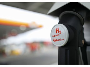 A hydrogen fuel pump sits in its holder at Royal Dutch Shell Plc's first U.K. hydrogen refueling station in Cobham, U.K., on Wednesday, Feb. 22, 2017. Shell, crafting a strategy to wean itself off oil, is expanding its operations in the refueling market for hydrogen cars.