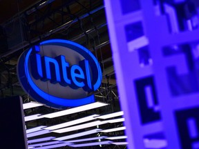 HANOVER, GERMANY - JUNE 12: The Intel logo is displayed at the Intel stand at the 2018 CeBIT technology trade fair on June 12, 2018 in Hanover, Germany. The 2018 CeBIT is running from June 11-15.