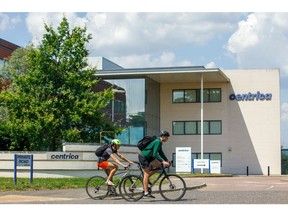 Cyclists pass the headquarters of Centrica Plc at Windsor, U.K., on Tuesday, July 20, 2021. Centrica are due to report earnings on July 22.
