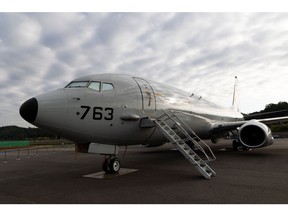 A U.S. Navy P-8 Poseidon military aircraft, manufactured by Boeing Co., stands on display at the Seoul International Aerospace & Defense Exhibition (ADEX) at Seoul Airport in Seongnam, South Korea, on Monday, Oct. 18, 2021. The exhibition opens on Oct. 19 and will run through Oct. 23.