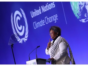 Mia Mottley delivers a speech at COP26 in Glasgow on Nov. 2021. Photographer: Yves Herman/WPA Pool/Getty Images