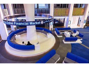 Investors visit the Dubai Financial Market PJSC (DFM) in Dubai, United Arab Emirates, on Wednesday, Aug. 24, 2022. Photographer: Christopher Pike/Bloomberg