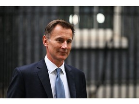 LONDON, ENGLAND - OCTOBER 14: New UK Chancellor Jeremy Hunt leaves 10 Downing Street on October 14, 2022 in London, England. Former Health and Foreign Secretary, Jeremy Hunt, is made Chancellor of the Exchequer by PM Liz Truss after she sacked Kwasi Kwarteng from the role.