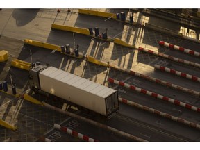 A truck stops to check-in at the Port of Dover Ltd. in Dover, UK, on Monday, Jan. 30, 2023. Brexit and the Covid pandemic were blamed for creating huge lorry driver shortages, causing pay in the sector to skyrocket and forcing ministers to intervene. Photographer: Jason Alden/Bloomberg