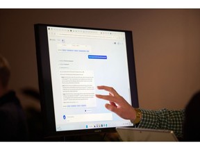 An attendee interacts with the AI-powered Microsoft Bing search engine and Edge browser during an event at the company's headquarters in Redmond, Washington, US, on Tuesday, Feb. 7, 2023. Microsoft unveiled new versions of its Bing internet-search engine and Edge browser powered by the newest technology from ChatGPT maker OpenAI. Photographer: Chona Kasinger/Bloomberg