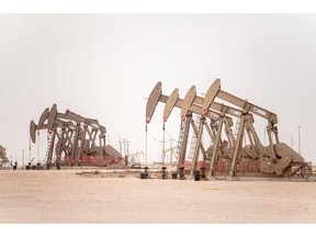 Oil pump jacks in Midland, Texas, US, on Thursday, March 2, 2023. Thousands of miles away from the turmoil on Wall Street, Midland, Texas that ranked No.1 in the US for inflation just over a year ago has since ceded that title – only to lay claim to a different one: the country's pay-raise capital. Photographer: Sergio Flores/Bloomberg