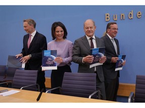 Christian Lindner, Annalena Baerbock, Olaf Scholz, and Boris Pistorius, from left, in Berlin on June 14. Photographer: Sean Gallup/Getty Images