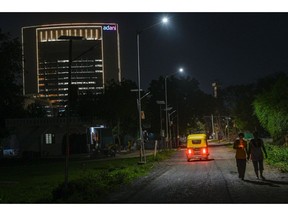 The Adani Group headquarters, left, in Ahmedabad, India, on Wednesday, June 21, 2023. US authorities are looking into what representations Adani Group made to its American investors following a scathing short seller's report that accused the company of using offshore companies to secretly manipulate its share prices.