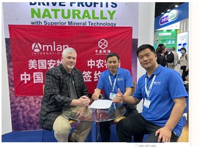 Dr. Wade Robey, Vice President of Agriculture Oil-Dri Corporation of America, and President, Amlan International with Mr. Zhu Xinmin, General Manager, and Mr. Yang Yang, Partner, Beijing Zhongnong Pasture Biotechnology Co., Ltd. partners