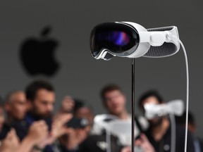 he new Apple Vision Pro headset is displayed during the Apple Worldwide Developers Conference on June 5.