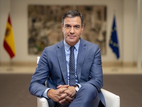 FILE - Spain's Prime Minister Pedro Sanchez poses for a portrait at the Moncloa Palace in Madrid, Spain, Monday, June 27, 2022. Spain's Socialist Prime Minister Pedro Sánchez has called an early general elections for July 23. Sánchez made the surprise announcement Monday, a day after his Socialist party took a serious battering in local and regional elections.