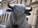 The bull sculpture representing the rise of the market by artist Reinhard Dachlauer is pictured in front of the stock exchange operated by Deutsche Boerse AG in Frankfurt am Main, western Germany.