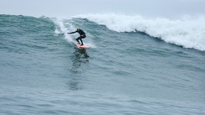 Lionel Conacher emerging from a surf session in Tofino, B.C., on the northwest coast of Vancouver Island. Surf Canada is headquartered in Victoria.