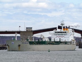 An oil tanker owned by Irving Oil arrives in Portland Harbor to unload fuel, in South Portland, Maine, Thursday, April 22, 2021. Irving Oil says a strategic review of the company is underway and that it is looking at a series of options about its future, including a sale.