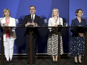 From left, Swedish People's Party chair Anna-Maja Henriksson, National Coalition Party chair Petteri Orpo, The Finns Party chair Riikka Purra and Christian Democrats chair Sari Essayah announce that the government programme is ready in Helsinki, Finland, Thursday, June 15, 2023. The head of Finland's conservative National Coalition Party, which came first in the April 2 elections, will present Friday, June 16, 2023, a government program for a center-right coalition that includes a far-right anti-immigration party with "saving measures." NCP leader Petteri Orpo, who is expected to become the Nordic nation's next prime minister, said four parties had agreed to form a government.