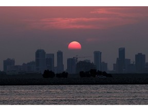 The skyline of the Bahraini capital Manama at sunset. Photographer: Giuseppe Cacace/AFP/Getty Images