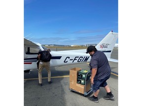 LifeLabs courier loading replacement supplies onto aircraft at YYJ