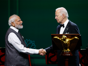 Joe Biden and Indian Prime Minister Narendra Modi shake hands