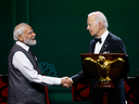 U.S. President Joe Biden and Indian Prime Minister Narendra Modi  shake hands during a state dinner at the White House on June 22 in Washington, D.C. 