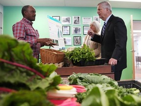 Tom Vilsack, U.S. Secretary of Agriculture, right, talks with farmer Sylvain Bukasa, of Dunbarton, N.H., at Fresh Start Food Hub & Market, Thursday, June 15, 2023, in Manchester, N.H. The U.S. Department of Agriculture is seeding agricultural producers and food businesses with millions of dollars in investments designed to improve markets, create and strengthen jobs, fight rising food prices and improve nutrition, Vilsack said Thursday.
