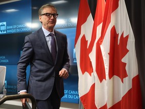 Governor of the Bank of Canada Tiff Macklem leaves after a press conference at the Bank of Canada in Ottawa.